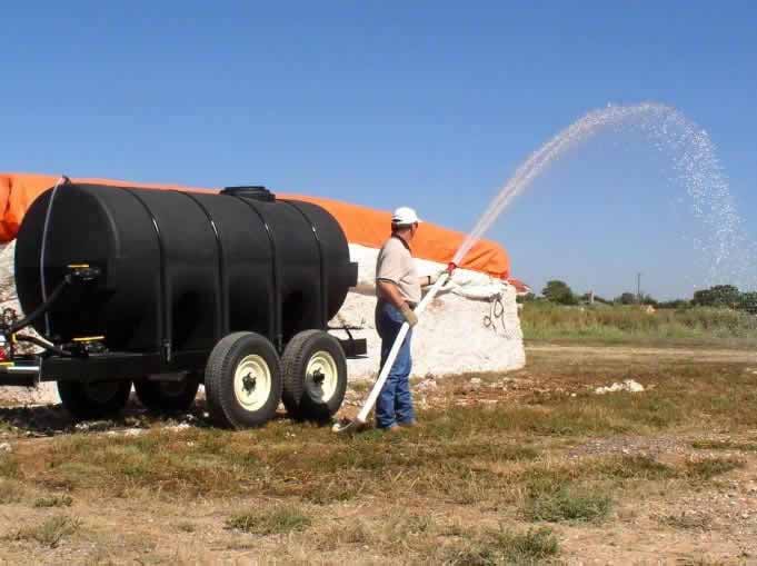 500 Gallon Water Tank Trailer. Comes with Spray Bar and Fire Hose