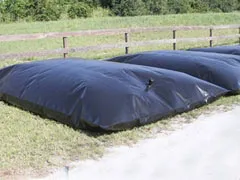 Pillow Tank Portable black pillow water tank used for liquid storage in outdoor settings, ideal for emergency or temporary water containment.