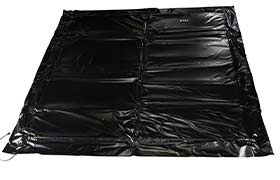 10x10 black concrete blanket laid out for thermal protection during cold-weather construction projects.