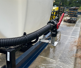 Close up shot of the rear sprayer on a water trailer