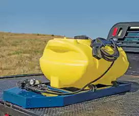 Compact 60-gallon yellow skid sprayer mounted on a truck bed for easy transport and spraying applications.