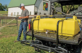 Man Spraying with Skid Sprayer