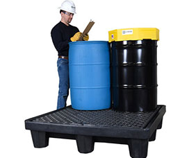 Spill containment pallet with two drums on it